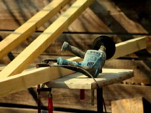 Grinder tool sitting on work table on a construction jobsite