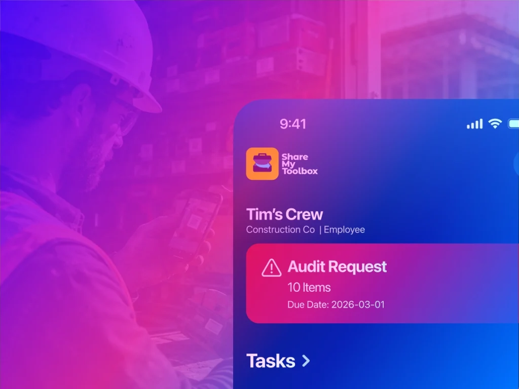 Construction worker scanning a barcode-tagged power tool with a smartphone at a jobsite while receiving a mobile audit request notification in ShareMyToolbox tool tracking software.